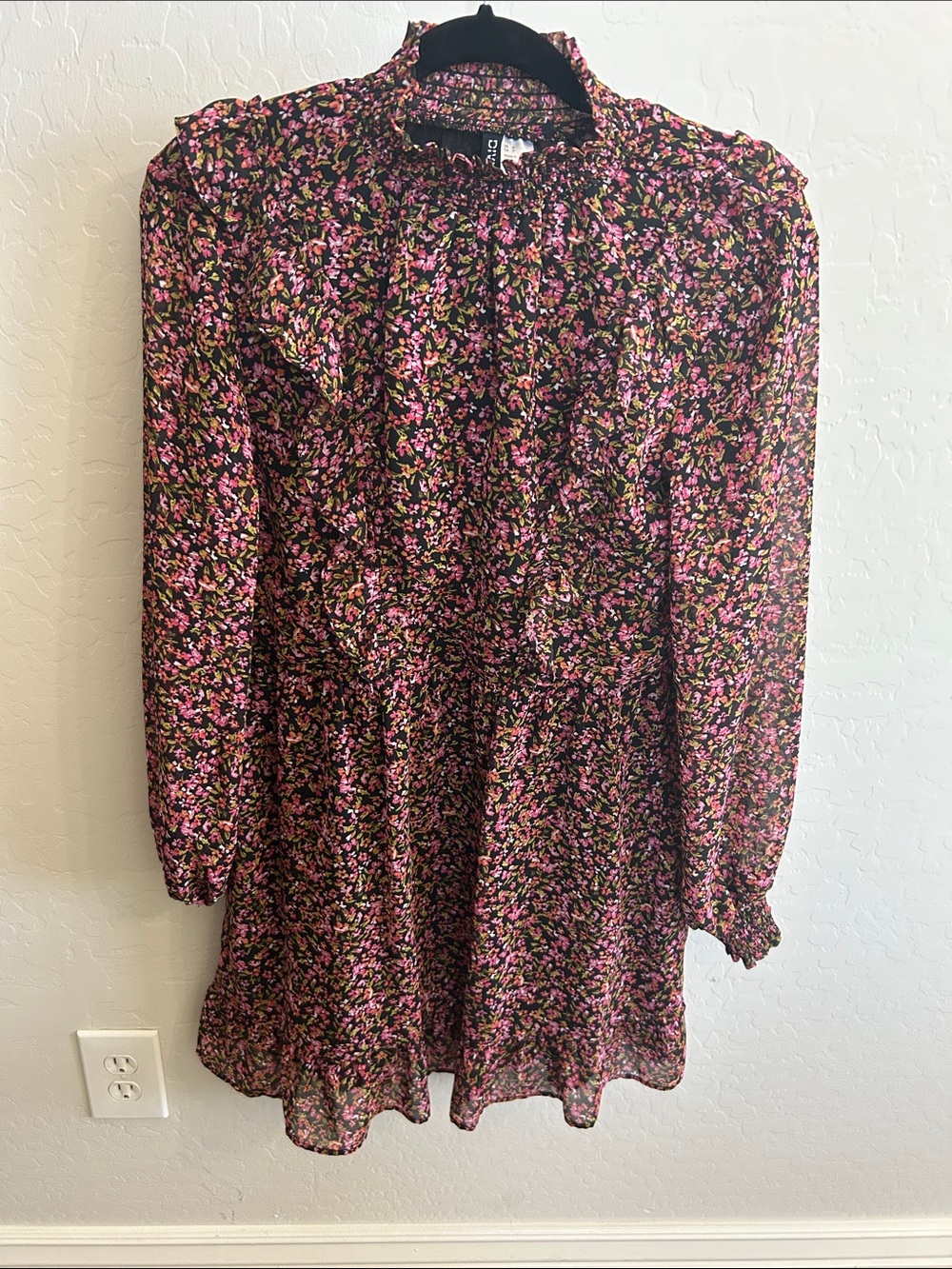 Divided floral long-sleeve mini dress in black with pink and green print
